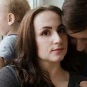 another-family-loses-health-and-home-to-mold Concerned man and woman with child in the background