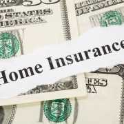 Home Insurance written over US money