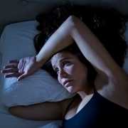 Sick woman with signs of mold illness Woman in bed showing signs of mold illness