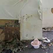 Woman saddened by flood damage