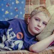 Health effects of toxic mold Sick young boy laying down
