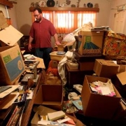 Male hoader in a messy room Male hoader in a messy room