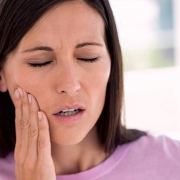 dental problems Woman with dental pain from mold