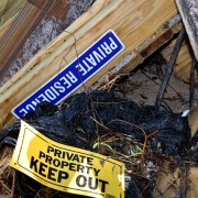 Debris from Hurricane Hurricane damage with keep out sign